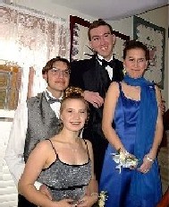 Prom '99!  Anita is in the gray dress leaning against her boyfriend, Roland